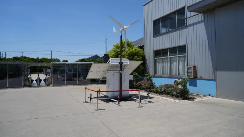 A wind turbine with liquid-cooled energy storage cabinets, a mobile office, and battery performance.