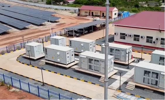 Solar microgrid system with panels, storage, and control units for sustainable energy.